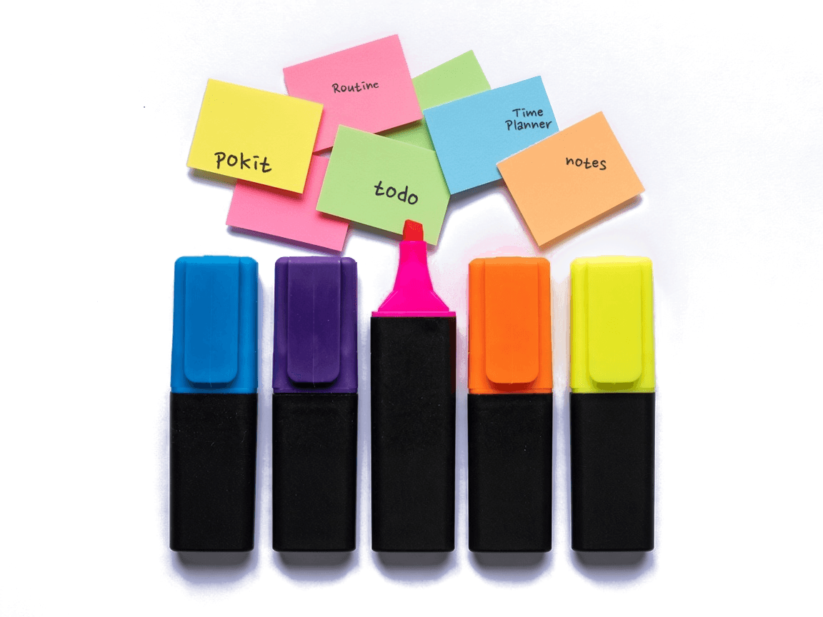 Highlighters and sticky notes labeled pokit, Routine, todo, Time Planner, and notes